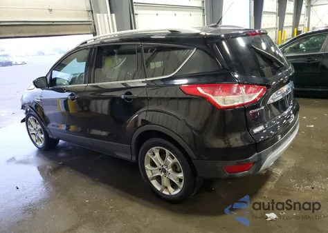 2016 Ford Escape Titanium z USA, uszkodzony, nr VIN 1FMCU9JX7GUB72669